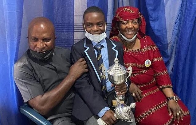 Sylvester Oromoni and his parents
