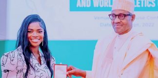 Tobi Amusam receives award from Buhari