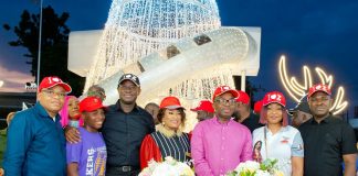 The Group Managing Director/CEO of Zenith Bank Plc, Mr Ebenezer Onyeagwu (3rd Right) flanked by the wife of the Founder and Chairman of Zenith Bank Plc, Mrs Kay Ovia (4th Left); Executive Director, Mr Dennis Olisa (1st Left); Executive Director, Dr Temitope Fasoranti (3rd Left); Executive Director, Mrs Adobi Nwapa (2nd Right); and Executive Director, Mr Henry Oroh (1st Right) at the 2022 Zenith Bank Christmas Light-Up of Ajose Adeogun Street, Victoria Island on Saturday, November 19.